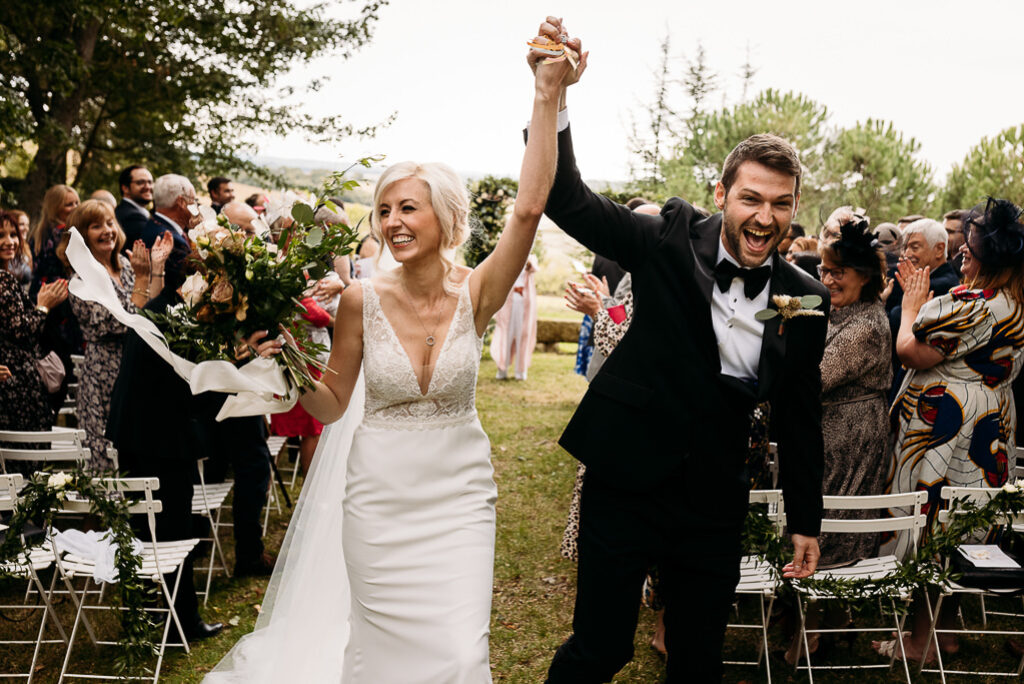 40 Upbeat Recessional Songs To End Your Wedding Ceremony