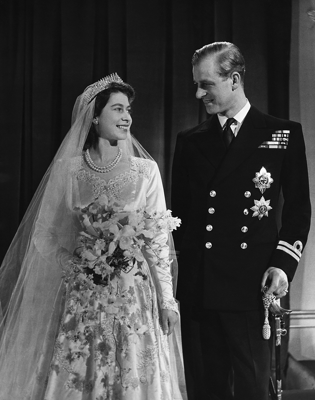 Queen Elizabeth II’s Wedding Cake Slice Sells for Mega Price