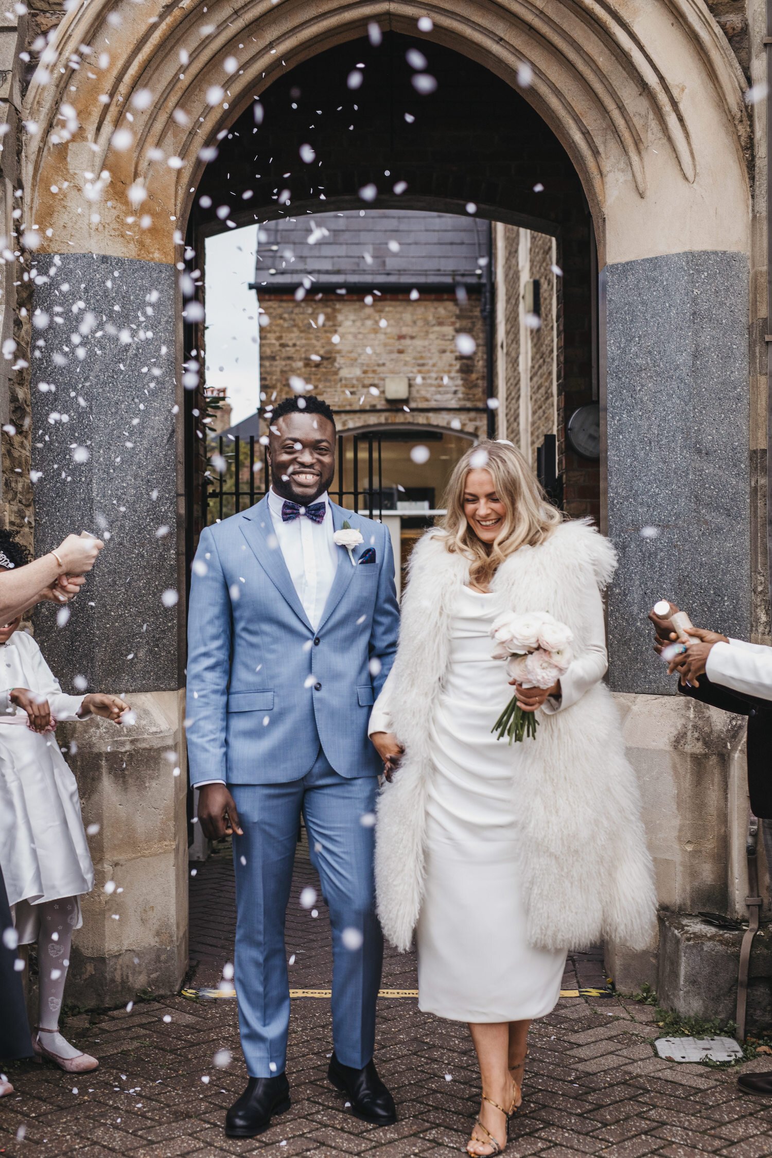 28 Brides in Wedding Coats That Utterly Wowed Us
